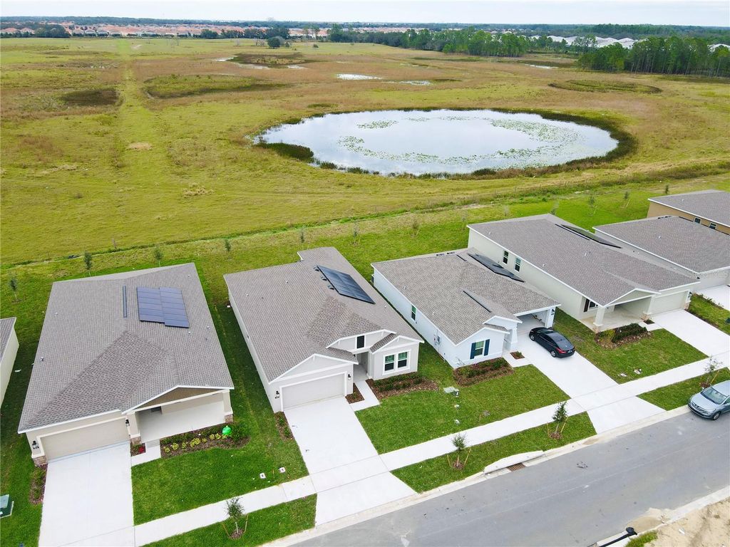 Photo of 700 Daring Drive, Davenport, FL 33837 (MLS # O6400437)