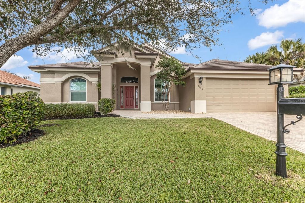 Photo of 13752 Long Lake Lane, Port Charlotte, FL 33953 (MLS # C7520246)