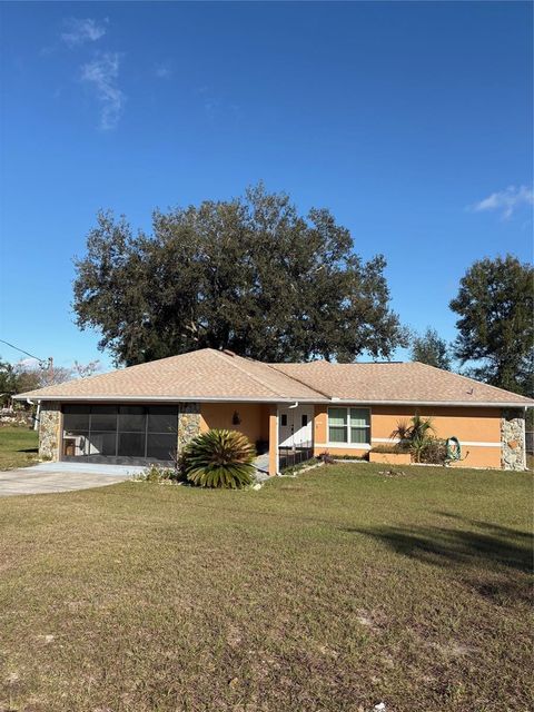 Photo of 21425 SW Plantation Street, Dunnellon, FL 34431 (MLS # OM717121)