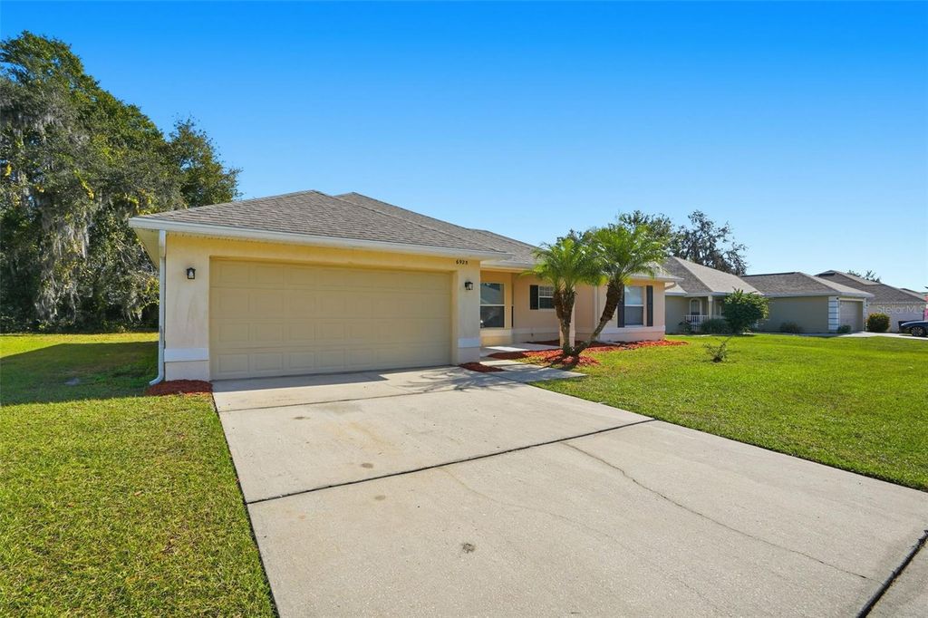 Photo of 6925 Krenson Oaks Street, Lakeland, FL 33810 (MLS # O6369562)