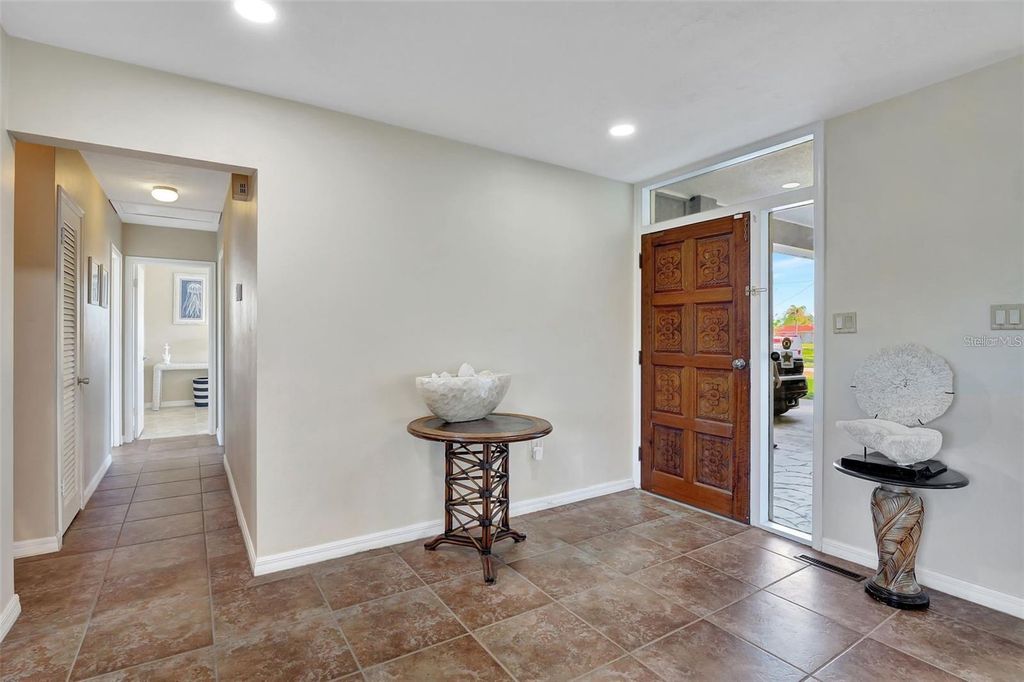 Photo of 250 Bangsberg Road SE, Port Charlotte, FL 33952 (MLS # C7522174)