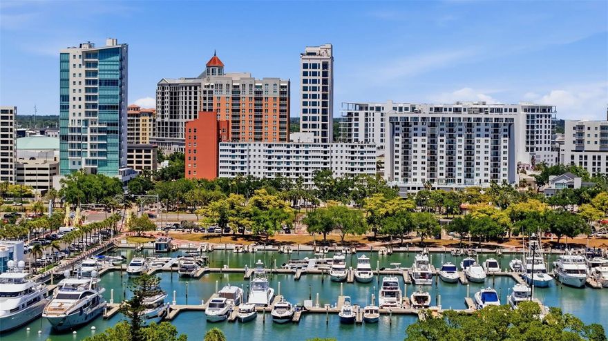 Your pied-à-terre for city living in Sarasota awaits you in Gulfstream Towers! Where fully renovated interiors meet panoramic Sarasota Bay and Marina Jack views. This move-in ready residence offers the ideal combination of waterfront living, walkability, and flexible space design in one of downtown Sarasota’s most desirable locations. This light-filled residence features impact windows and doors and expansive glass framing unobstructed views of Sarasota Bay and Marina Jack. The interior has been fully renovated with high-end finishes, highlighted by a modern galley kitchen with quartz countertops, large single-basin sink, wine cooler, sleek cabinetry, stainless steel appliances, water filtration system, and LED accent lighting, all flowing seamlessly into the open living and dining areas. A standout feature is the Clei Italian custom-built Murphy bed system, allowing the space to effortlessly transition between a living area and bedroom, ideal for full-time living, seasonal use, or a lock-and-leave lifestyle. Additional highlights include tile flooring throughout, contemporary finishes, efficient layout, and abundant natural light.
Located in a secure waterfront building, residents enjoy amenities including a heated pool with expansive furnished sun deck, fitness center, private storage, community/entertaining room with full kitchen and dining area, library, bike storage, and laundry facilities on each floor. With only 9 units per floor, the building offers a quiet, boutique feel. Prime downtown Sarasota location—just steps to Marina Jack, Bayfront Park, Selby Gardens, award-winning restaurants, theaters, the Sarasota Opera House, and year-round cultural events. Complimentary trolley service provides convenient access to St. Armands Circle and Lido Key beaches. Buyer to verify all measurements, HOA fees, rental restrictions, and pet policies.