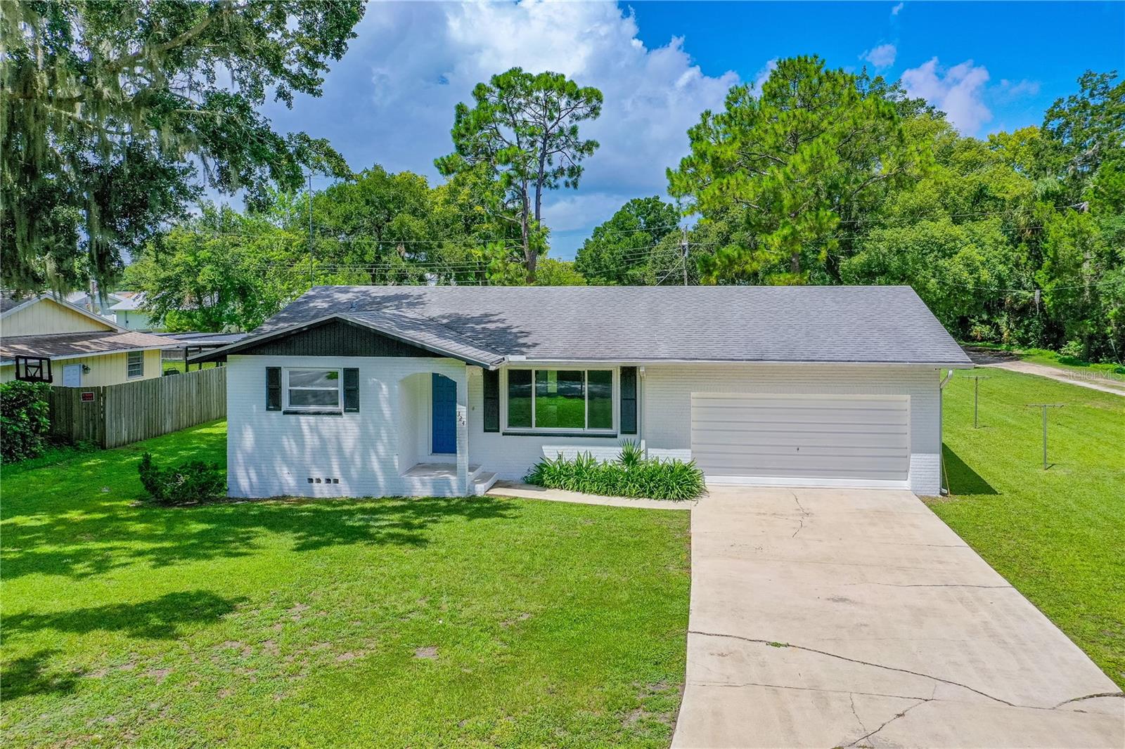 This house DID NOT FLOOD!!! This 3 bedroom, 2 bath, concrete block home has been completely updated with high-end finishes, with no expense spared. This house sits at the end of a quite street with little to no traffic. The master bath has been fully remodeled with custom tiled walls and walk-in shower. Fully remodeled spare bathroom with custom tile. All new wood kitchen cabinets with soft-close hinges. Complimented by new Quartz countertops, and stunning backsplash. Porcelain wood grain tile in kitchen and laundry room, and all new life proof laminate flooring in remainder of home. All new double pane ''Low-E'' windows with full life time transferrable warranty, installed by Window World. New custom barn door that leads to the inside unit laundry room. All new outlets and water valves throughout the home. Screened in back porch. Freshly painted, inside and out. Close to the interstates, shopping, universities, and yes... THE BEACH. All of this with NO HOA! Roof 2015.