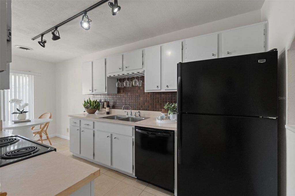 Photo of 2076 Sunset Point Road #142, Clearwater, FL 33765 (MLS # TB8554210)
