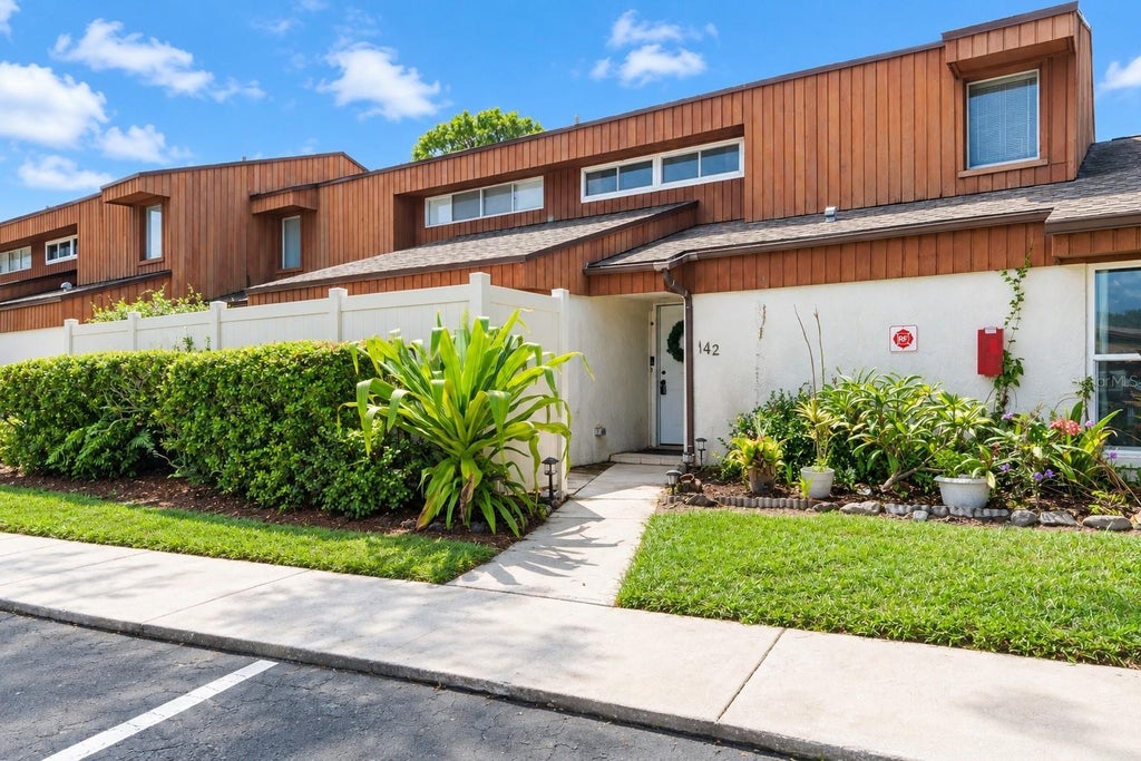 Photo of 2076 Sunset Point Road #142, Clearwater, FL 33765 (MLS # TB8554210)