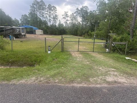 Photo of 10220 Crotty Avenue, Hastings, FL 32145 (MLS # FC320203)