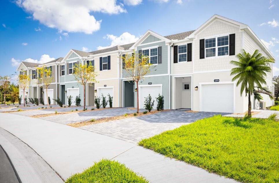 Move-in Ready! Welcome home to Pine Pointe at Astonia, a new low-maintenance townhome community with easy access to major highways, everyday conveniences, and resort-style amenities. Enjoy low-maintenance living at a great value near Champions Gate and I-4. Resort-style pool, cabana, tot lot, dog park, and open green space. Included paver patio and privacy fence between neighbors. HOA includes internet, cable, lawn and exterior maintenance, & roof replacement. The Mayport. Enter this one-car garage attached home through the covered front porch. The welcoming foyer leads your eye to the spacious living area. Gather in the great room with friends and family before enjoying a home cooked meal prepared in your charming kitchen and served on the large island. Upstairs, two bedrooms and a full bath offer privacy for guests. A conveniently placed second floor washer and dryer make laundry easy. Your luxury owner’s suite includes two large walk-in closets and a spa-like dual vanity bath. The Mayport is a must-see. All Ryan Homes now include WIFI-enabled garage opener and Ecobee thermostat. **Closing cost assistance is available with use of Builder’s affiliated lender**. DISCLAIMER: Prices, financing, promotion, and offers subject to change without notice. Offer valid on new sales only. See Community Sales and Marketing Representative for details. Promotions cannot be combined with any other offer. All uploaded photos are stock photos of this floor plan. Actual home may differ from photos.