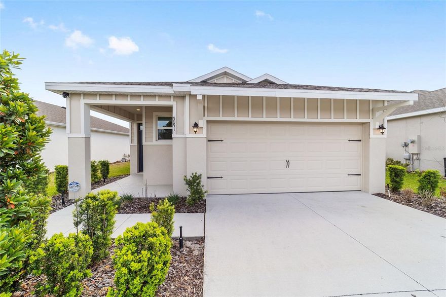 One or more photo(s) has been virtually staged. Welcome to Beaumont—one of Wildwood’s most desirable gated communities offering a prime location near The Villages.  Water view! Step into this beautifully designed home in the heart of Beaumont, where comfort meets convenience. Built with today’s lifestyle in mind, this home offers an open-concept floor plan with spacious living areas, abundant natural light—perfect for both relaxing and entertaining. The kitchen serves as the centerpiece of the home, featuring granite countertops, modern cabinetry, and a large island that overlooks the main living space—ideal for gatherings or everyday living. A thoughtfully designed split-bedroom layout provides privacy, while the primary suite offers a peaceful retreat with a walk-in closet and en-suite bath.  Enjoy Florida living year-round with a covered screened in lanai and backyard space perfect for morning coffee or evening unwinding. Enjoy access to a resort-style pool, clubhouse, fitness center, pickleball and bocce courts, and scenic surroundings. The HOA also covers conveniences like lawn maintenance, internet, and cable, creating a truly low-maintenance living experience. Located just off CR 466A, this home is minutes from shopping, dining, and everyday essentials, with quick access to entertainment, golf, and recreation in The Villages. Whether you're looking for a full-time residence, seasonal retreat, or investment opportunity, this home offers the perfect blend of location, lifestyle, and value.  Schedule your private showing today and discover why Beaumont is one of Wildwood’s fastest-growing communities.