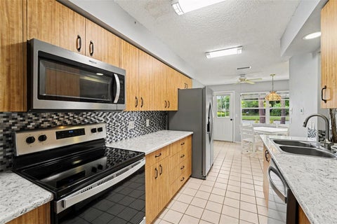Photo of 9022 Ramsgate Drive, New Port Richey, FL 34655 (MLS # TB8551763)
