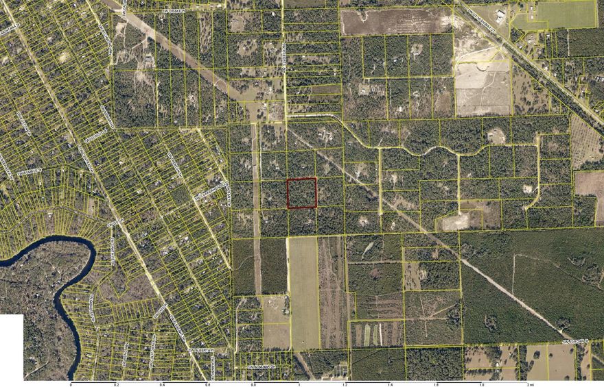 Discover the potential of this 10.01-acre wooded parcel located in the desirable Three Rivers Estates area of Fort White. Situated on a large corner lot with plenty of potential, this property offers ample space and flexibility for a variety of residential, recreational, or mixed-use possibilities within A-3 zoning. The land features a natural wooded setting that provides privacy and a peaceful North Florida landscape. Existing improvements include one well and one septic system, along with utilities nearby including electric, water, and sewer availability, helping simplify future development plans. The property sits along a quiet dirt road with road frontage on the North and East boundaries, offering a serene rural atmosphere while still providing access to essential services. Located within the Three Rivers Estates community, owners can enjoy nearby access to the Santa Fe River, community and private boat ramps, fishing opportunities, and waterfront recreation. Whether you're looking to build a primary residence, create a weekend retreat, build up a hobby farm, or invest in acreage with natural beauty, this property offers space, flexibility, and access to outdoor recreation. With 10+ acres of wooded land, existing infrastructure, and proximity to the Santa Fe and Ichetucknee River areas, this parcel presents a rare opportunity to own a sizable piece of North Florida countryside while still being within reach of nearby towns and amenities. Buyer to verify all measurements, utilities, zoning, and land use possibilities.