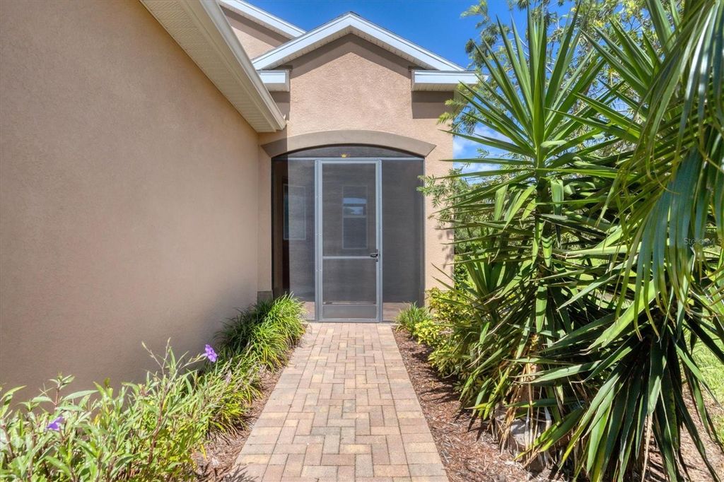 Photo of 25713 Boysen Berry Avenue, Englewood, FL 34223 (MLS # A4658028)