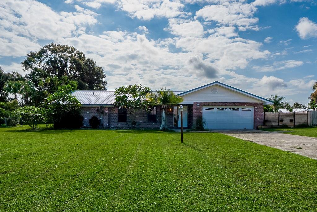 Welcome to this beautifully updated 4 bedroom, 3 bath pool home, ideally positioned on a half-acre lot in the highly desirable gated community of Lake Link. Surrounded by oak-lined streets and refreshing lake breezes, this home combines elegant updates with a functional layout designed for everyday living and entertaining.
Inside, an inviting open floor plan is anchored by the gourmet kitchen, finished with granite countertops, a stylish glass tile backsplash and a breakfast nook overlooking the pool. The living and dining areas flow seamlessly, while a spacious family room provides additional flexibility for gatherings. Luxury vinyl flooring runs throughout, creating a cohesive and modern feel.
The primary suite is a true retreat, offering generous dimensions, dual walk-in closets, and a private en-suite bath with double vanities. Two additional bedrooms are connected by an updated Jack-and-Jill bath, featuring a furniture-style vanity with granite countertop and a beautifully tiled shower/tub combo. A separate fourth bedroom and full pool bath provide ideal accommodations for guests.
Step outside to discover the ultimate outdoor living experience: a screened lanai with sparkling pool, expansive deck space, and plenty of room for dining, lounging, and entertaining. The oversized half-acre lot allows for a spacious backyard with endless possibilities—from play areas and gardens to creating your own outdoor oasis. A side-entry two-car garage adds convenience and curb appeal.
Beyond the home, Lake Link is known for its quiet streets, mature landscaping, and walkable setting where neighbors enjoy evening strolls and bike rides. Just minutes away, downtown Winter Haven offers boutique shopping, farm-to-table dining, a vibrant arts scene, and the weekly farmers market. Outdoor enthusiasts will love the city’s famous Chain of Lakes for boating and fishing, as well as multiple golf courses nearby. Centrally located, Winter Haven also provides easy access to Orlando, Tampa, and Florida’s stunning Gulf and Atlantic beaches.
This home perfectly blends style, comfort, and location—offering the best of Florida living in one of Winter Haven’s most established gated communities.