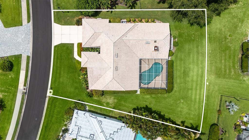 Photo of 4871 Winterhaven Drive, Sarasota, FL 34233 (MLS # A4693755)