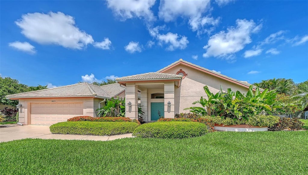 Photo of 4871 Winterhaven Drive, Sarasota, FL 34233 (MLS # A4693755)