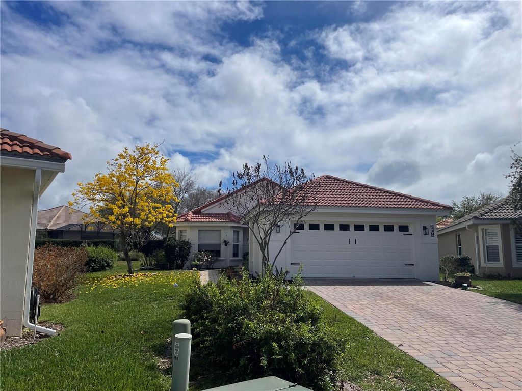 Photo of 319 Niblick Circle, Winter Haven, FL 33881 (MLS # O6388012)