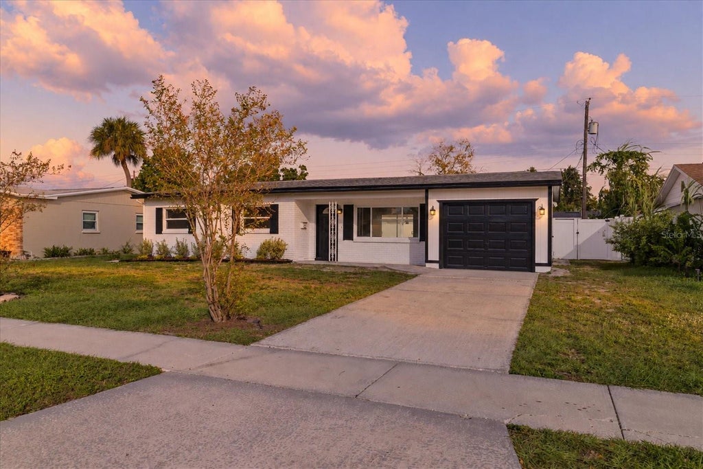 Photo of 6017 Ambassador Dr, Tampa, FL 33615 (MLS # O6454153)