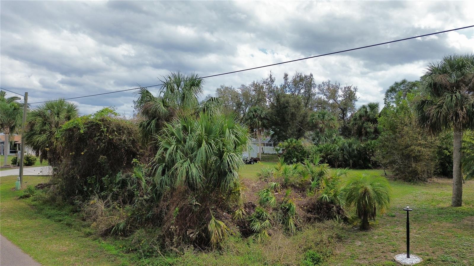 GREAT LOT with PUBLIC WATER located in prime location!!!!Discover the perfect opportunity to own a piece of North Port, FL, in the heart of a rapidly expanding area. Great vacant lot near famous Warm Mineral Spring Lake, a local gem and Wallen Park downtown area and the highly anticipated new Costco store. Great opportunity to buy and build in the heart of fast growing area of North Port, FL. This property is perfectly situated near shopping centers, a variety of dining options, beautiful parks, stunning beaches, and world-class golf courses. Easy access to U.S 41 and Interstate 75 for smooth commuting and travel. Enjoy the freedom of no HOA, Deed Restrictions, or CDD fees, making it an ideal canvas for your dreams. Don't let this incredible property pass you by. Seize the moment to invest in this exceptional opportunity. Your dream home or investment project awaits!