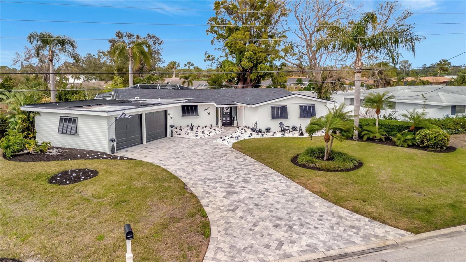 Welcome to your own paradise in Sarasota FL 34239. PRIVATE back and side yard! NO building behind you....NO HOA! This POOL home with 2 BR plus den or 3 BR and 2 BA. Perfect for Entertaining..opens up completely to pool. As a Rental property 3BR/2Ba. Closets galore..linen...2 walk-in closets.. coat closet..Double closet in 3rd Den/Br. Upgraded paver driveway. Eat-in kitchen with pantry and newer appliances.. Third Den/BR adjoins the master bedroom and is being used as a home office/den. Small room off the eat-in kitchen makes a cozy home office inside the utility room. Convenient pass through from the kitchen plus double pocketing sliding doors from the living and dining room to the large under roof lanai and caged pool makes entertaining a breeze. Double pane windows and doors means energy efficiency. New A/C in 2023 New roof 2022. Reverse osmosis water purification system in the kitchen for drinking and cooking. Whole house water softener. The sprinkler system runs off a well. Location Location Location just minutes from Siesta Key beach, Trader Joe's, CineBistro, Southside Village, Sarasota Memorial Hospital Medical complex, Downtown Sarasota and the bayfront. Call today for your private tour. #JustAnotherDayInParadise