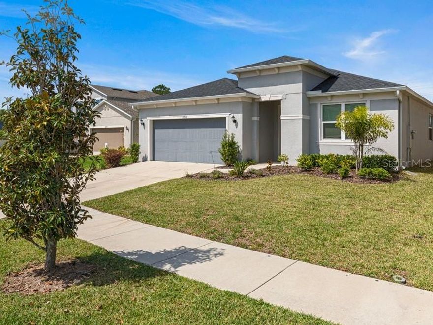 Gated neighborhood and nestled on a cul-de-sac street. Complete with 4 bedrooms, 3 full baths, 2,328 square feet of living space and a spacious 2 car garage. Wood-like tile floors flow into the foyer for a grand entrance and easy maintenance. The kitchen is definitely the heart of the home and features beautiful granite counter tops, built-in double ovens, built-in glass cooktop, stainless appliances, wood cabinets, recessed lights, large walk-in pantry and a large center island and pendant lighting. The dining area has plenty of room for entertaining and family gatherings. The master bedroom has plush carpet, ceiling fan, large walk-in closet and private ensuite. Additional bedrooms have carpet and spacious closets. Enjoy each morning out back in the covered patio. There's plenty of room for grilling, lounging and backyard space for additional outdoor activities. West Lake Reserve is a quiet community with easy access to Linebaugh and Sheldon Rd. Convenient to schools, shopping and great restaurants. Close to the Veterans Expressway. Ready for immediate occupancy. Sorry, but no pets allowed.