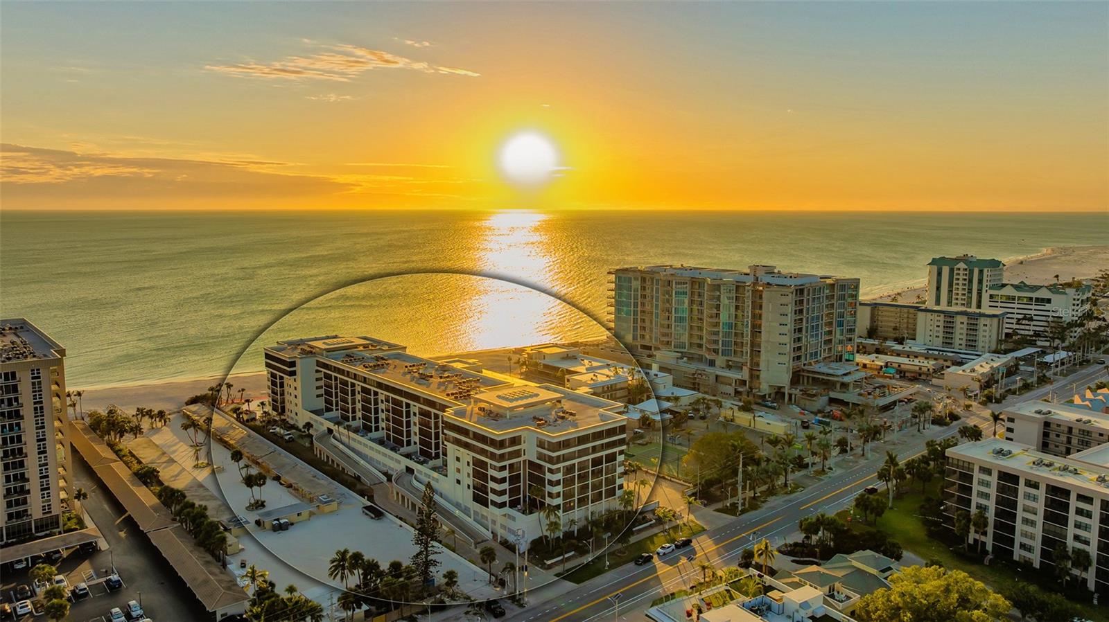 Stunning Corner View Condo! Your Beachfront Retreat Awaits! Welcome to this MUST-SEE, fully updated corner unit at Lido Surf & Sand, offering 1,456 sq.ft. of luxurious living with breathtaking views! This turn-key, fifth-floor residence boasts North, Northwest, and East-facing vistas of the sparkling Gulf waters, the serene Intercoastal Waterway, and the dynamic city skyline. With a sophisticated coastal design, this condo perfectly blends relaxation and elegance, offering the ultimate beachfront lifestyle. Inside, the open floorplan is designed with entertaining in mind, featuring a bright and airy Great Room that seamlessly flows into a spacious sunroom/screened lanai. Here, the tropical breezes and the soothing sounds of waves crashing on the shore will immediately put you at ease—your own personal slice of paradise! Whether enjoying morning coffee or evening sunsets with a glass of wine, this expansive lanai is truly a highlight of the home. The kitchen is a chef’s dream, complete with a large island with granite countertops, updated cabinetry, a built-in desk with file cabinets, and abundant storage space. The split floorplan includes two spacious bedrooms and two full bathrooms, with the primary suite offering a serene retreat, featuring an ensuite bath and a walk-in closet. Additional features include remote-controlled shades on sliding glass doors, plantation shutters in both bedrooms, crown molding, and an array of modern updates like a 2023 A/C, a tankless hot water heater, and an in-unit washer and dryer. Lido Surf & Sand delivers resort-style amenities that will elevate your lifestyle, including a beautiful beachfront pool and spa with poolside grills, a tropical dining portico, a sauna, fitness center, and shuffleboard. The building also offers secure underbuilding parking, climate-controlled storage, on-site management, and plenty of guest parking. The location is unbeatable, just blocks from the world-class shopping and dining of St. Armand’s Circle, across from a nature preserve perfect for kayaking, paddle boarding, and fishing, and steps from the white sands of Lido Key. Whether you're looking for a primary residence or an exceptional vacation home, this condo is an absolute must-see. Start your day with a cup of coffee on your incredible lanai, and end it with a glass of wine as you watch the sun set over the Gulf. Live among multimillion-dollar complexes and experience the best of Lido Key. Live the dream. Love where you live. With its prime location, luxurious upgrades, and resort-style amenities, this condo offers the perfect blend of comfort and convenience. Experience the ultimate beachfront lifestyle at Lido Surf & Sand—your dream home is waiting. Call for more details and to schedule your private tour.