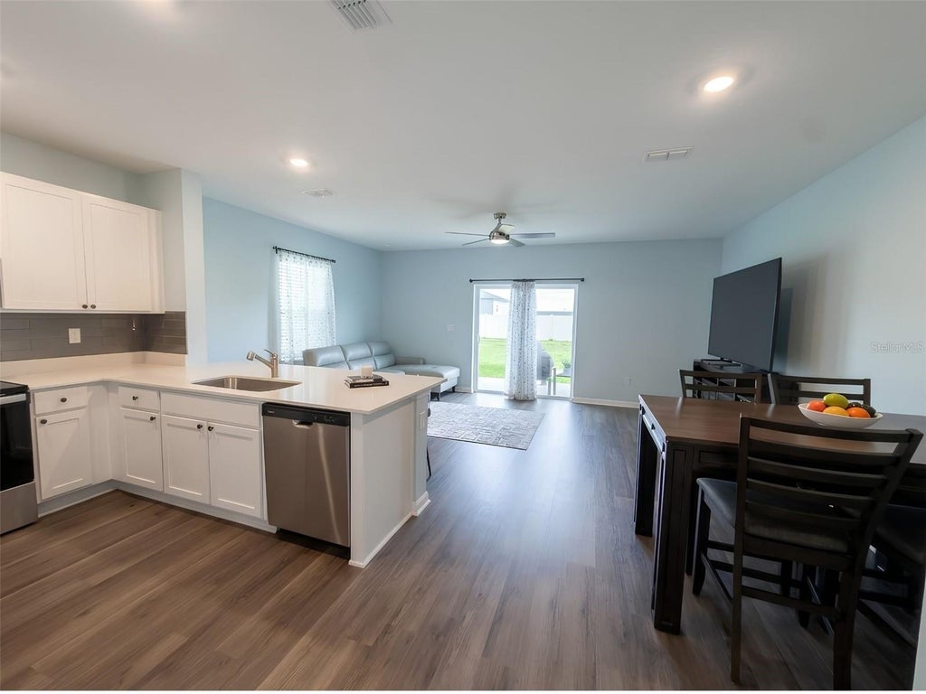 Photo of 1327 Tallowwood Lane, Davenport, FL 33837 (MLS # O6453809)