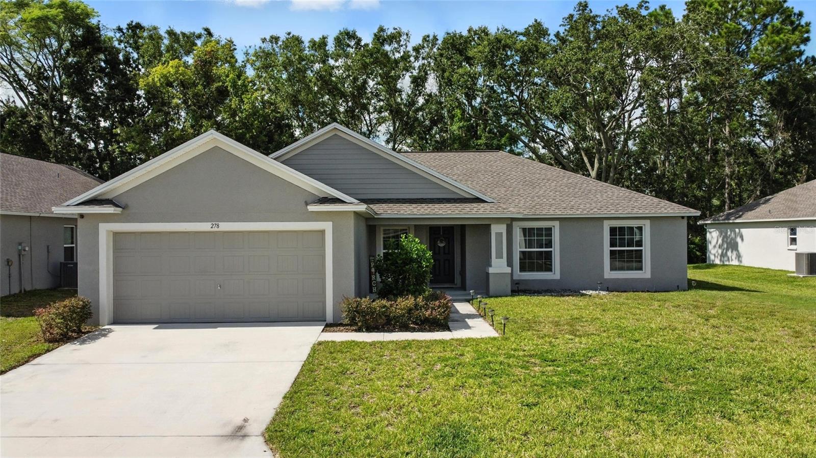 Like-New Home on Oversized Lot in Gated Community!
Welcome to this stunning, only 2-year-old home nestled in the serene and gated Cove at Eagle Lake community! Located on an OVERSIZED LOT and backing up to a PEACEFUL CREEK that winds through the rear of the neighborhood, this property offers a rare blend of privacy, nature, and modern living.
Inside, you’ll find a spacious and thoughtfully designed open floor plan, ideal for both everyday living and entertaining. The bright and airy living area features HIGH CELIINGS and low-maintenance tile flooring throughout the main areas. The modern kitchen shines with stainless steel appliances, ample cabinetry, sleek countertops, and a breakfast bar perfect for casual dining.
The primary suite serves as a private retreat with a walk-in closet and a luxurious en-suite bath with dual sinks and a soaking tub. Two additional bedrooms provide versatile space for guests, family, or a home office.
Step outside to your expansive backyard and tranquil creek — a perfect backdrop for relaxing evenings or weekend gatherings. With a 2-car garage, energy-efficient features, and indoor laundry, this home offers both comfort and convenience.
Located just minutes from Legoland, local schools, shopping, dining, and major highways, this home puts you in the heart of everything while still feeling like a private getaway.
Don't miss this rare opportunity — schedule your private showing today and fall in love with your new home!