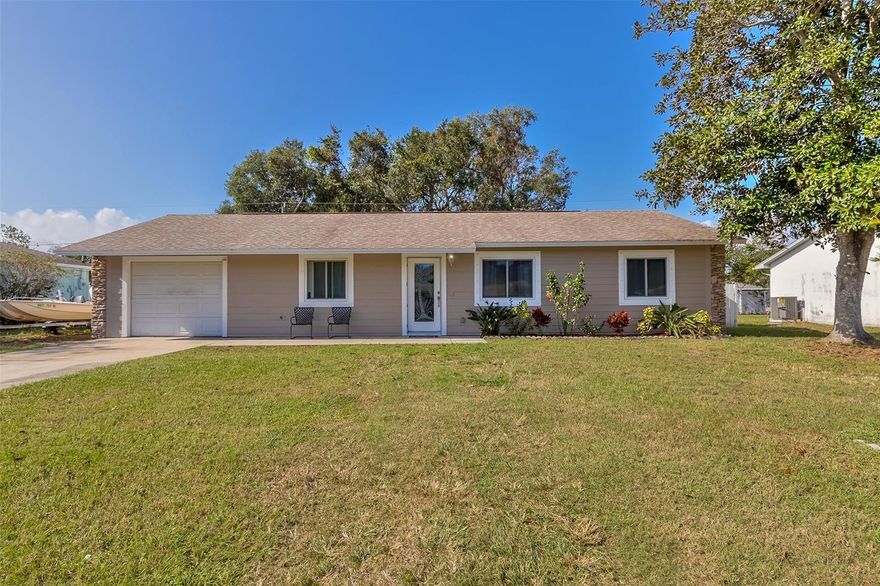 AMAZING OPPORTUNITY!! Recent appraisal reflects the home priced below appraised value!! Completely redone and this is not a flip. Its hard enough to find something reasonable to buy let alone a house that has already been transformed into a spectacular move in ready home with the biggest pool in Edgewater. This pool is bigger than most hotel pools and is ready for the biggest and most amazing pool party you have ever seen. Lets first take a walk inside. Upon entry as you bi-pass the adorable landscaping you will see an open floor plan concept with beautiful vinyl laminate flooring hugging every inch of the common area. All new trim frames out the newer double pained windows, LVP flooring and new front door. New fixtures and fans decorate the home as well. Enjoy family movie night in the large living room or entertain with the best of them. The dining room is conveniently located between the kitchen and living room with a sliding door that goes to the back yard oasis. The completely remodeled kitchen is pretty amazing. Butcher block cabinets, brand new stainless steel appliances, commercial style hood, farmhouse sink and plenty of storage in your shaker style cabinets. The laundry room is right off the kitchen and has a special treat attached to it. A portion of the 1 car garage was sectioned off and is perfect for an extended pantry, office, or just more storage. All the bedrooms are great in size and both bathrooms have been remodeled. Now lets head out back. You will not be short of space for the BBQ as this back yard is massive. The pool/hot tub are the biggest we've ever seen. Fully fenced and ready for the party. Beautiful tropical plants cascade around the pool and fence line creating the perfect oasis. The AC is new and the roof is only 14 years old. Fresh paint has coated the inside and the exterior has been wrapped in Hardiboard siding. Close to shopping, dining and of course 10 mins to the beach. CALL US BEFORE YOUR DREAM IS SOMEONE ELSES REALITY!! ;Water: City