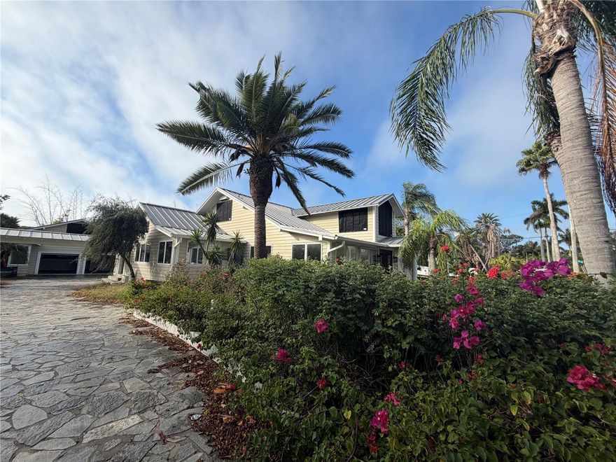 Rare opportunity on North Siesta Key’s Bay Island—one of the area’s most sought-after waterfront enclaves. Offered as-is, this 4,536-square-foot residence provides an exceptional opportunity to renovate, redesign, or completely reimagine to suit your vision for the home, while enjoying serene water views and an unbeatable island location.

Surrounded by luxury homes and tropical landscapes, the property offers the relaxed coastal lifestyle Siesta Key is known for, with bayside scenery, gentle breezes, and incredible upside. The home’s generous size allows for flexible design possibilities, making it ideal for customization in one of the island’s most premium, high-demand neighborhoods.

This is a phenomenal opportunity for an investor or end user seeking a large home on Siesta Key to transform however they choose. With significant potential to add value through renovation or redevelopment, this property represents a strong future investment opportunity in a market known for long-term appreciation. Whether planning a strategic update or a full-scale redesign, the upside is substantial.

An exceptional value for buyers looking to create something truly special.