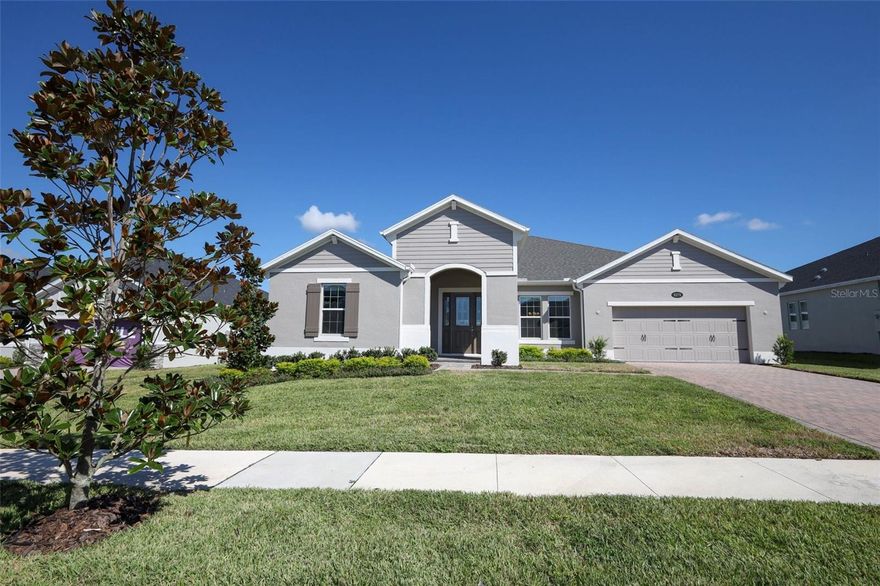 One or more photo(s) has been virtually staged. Welcome to 3279 Roseville Drive, Apopka, a beautifully designed new construction home built by M/I Homes in the sought-after Wolf Lake Ranch community. From the moment you arrive, the home’s crisp elevation, manicured landscaping, and inviting curb appeal set the tone for what’s inside.

Step through the entry and discover an open-concept layout where design and functionality come together seamlessly. The kitchen serves as the centerpiece, showcasing timeless white cabinetry, quartz countertops, stainless steel appliances, a sleek vent hood, and a large island perfect for gathering and entertaining. Flowing naturally from the kitchen, the spacious dining and living areas are filled with natural light, creating an inviting atmosphere for daily living.

Luxury vinyl plank flooring runs throughout the main living spaces, balancing durability with modern style. The primary suite is thoughtfully positioned, featuring a spa-inspired bath with dual vanities and an oversized walk-in shower. Secondary bedrooms and flexible spaces are tucked smartly into the design, accommodating the evolving needs of today’s homeowner.

Step outside to the covered lanai and backyard, where there’s room to relax, play, or create your dream outdoor living environment.

Living in Wolf Lake Ranch means more than just a new home—it’s a lifestyle. Residents enjoy a gated community with easy access to Wekiwa Springs State Park, Lake Apopka Wildlife Drive, and Northwest Recreation Complex, offering endless opportunities for outdoor adventure. Everyday conveniences are minutes away, including shopping, dining, and entertainment. Medical care is nearby with AdventHealth Apopka and Orlando Health facilities within reach, and commuting is simplified with quick connections to SR 429, SR 414, and major employment corridors across Central Florida.

3279 Roseville Drive is more than a home—it’s a place to build your future.