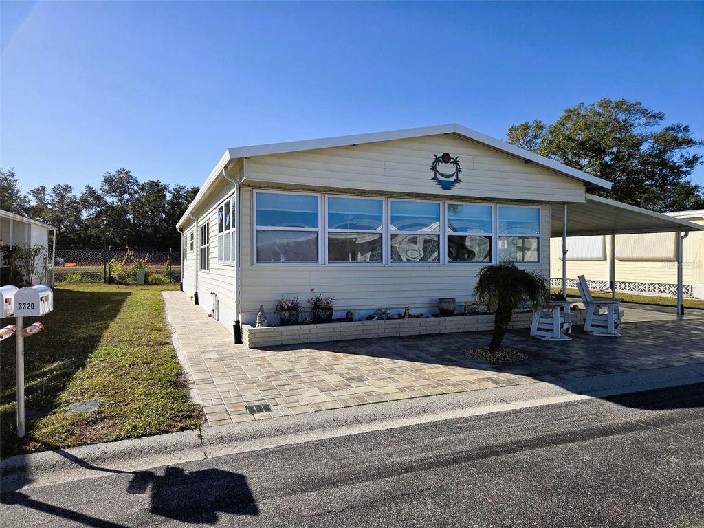 Photo of 3320 Oakwood Boulevard S, Sarasota, FL 34237 (MLS # A4678864)