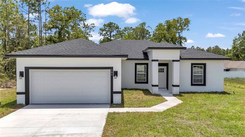 Photo of 586 Marion Oaks Trl, Ocala, FL 34473 (MLS # O6309090)