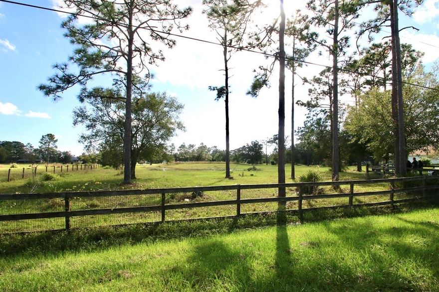 Fantastic chance to acquire 4.77 acres of prime land in the flourishing ROCKET CITY, ORLANDO AREA. This property boasts cleared and fenced terrain, adorned with abundant fruit trees, culvert, 2 ponds, and a spacious concrete pad measuring 52ft x 80ft. Embrace the convenience of residing near nature trails, lakes, and the Wedgefield Golf Club. Designated as Residential, this property is in proximity to schools, shopping centers, grocery stores, Orlando International Airport, and beautiful beaches. Plus, enjoy easy access to major highways like the 417, 528, 520, and SR 50. Don't miss out on this incredible opportunity!