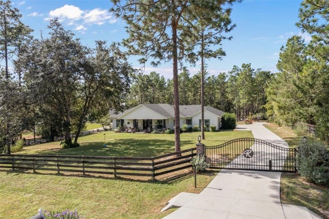 Photo of 8556 County Road 243, Wildwood, FL 34785 (MLS # OM733239)