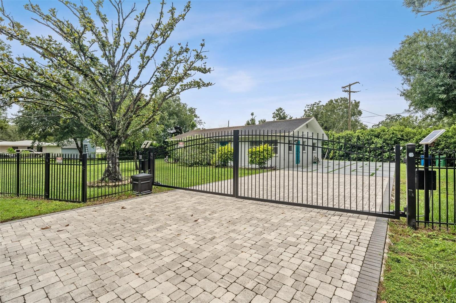 Welcome to this beautifully maintained 3-bedroom home on a spacious half-acre corner lot in the sought-after Riverbend community. Just steps from the river, you’ll enjoy serene views and a peaceful setting right from your front yard. The fully fenced property offers exceptional privacy with an electric gate at the entrance, while the expansive backyard is perfect for entertaining, complete with a charming gazebo for gatherings or relaxing evenings under the stars. With plenty of room to garden, play, or simply unwind, this property truly offers endless outdoor possibilities. Inside, comfort meets convenience in a home designed for both everyday living and special occasions. Centrally located, you’ll have an easy commute to downtown, USF, the airport, and Ybor City, plus you’re within walking distance to ZooTampa at Lowry Park and just minutes from the popular restaurants and nightlife of Seminole Heights. HVAC (2014) ,Roof (2024) ,Water heater (2022), Impact Windows (2023), Gated fence (2024) , Bathroom renovated (2024) LVP flooring (2024), Interior freshly painted (2025), Plumbing (2025), Gazebo (2025) , Kitchen updated (2023)m Washer/Dryer (2024/2025). Don’t miss this rare opportunity to own a private corner-lot oasis with tranquil river views! Special Buyer Incentive: When financing with SunPoint Home Loans LLC (NMLS #1559260), buyers may receive a free appraisal (up to $800 value), access to aggressive mortgage rates, and a lender-paid 1-0 temporary rate buydown (reducing the interest rate by 1% in the first year with no seller-paid concessions required) .