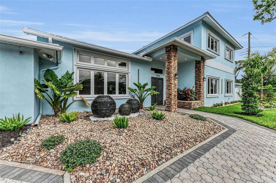 ***Price Improvement*** Discover an exceptional opportunity West of The Trail with this stunning residence, offering nearly 4,800 sq ft of luxurious living space. Originally re-built in 2004 by one of the area's most respected commercial contractors, this home was his personal residence during the renovations, ensuring it was built with the highest quality standards. The home combines elegance and modern convenience, featuring 4 spacious bedrooms, 4 full bathrooms, and 2 half bathrooms. The first-floor master suite boasts plank tile flooring, a jetted bathroom, and custom closets. A versatile bonus room on the second floor can easily become a fifth bedroom, while three additional bedrooms provide ample space for family or guests.

Designed for entertainment, the home includes a dedicated wing with a game room featuring a wet bar, wine fridge, and kegerator. Adjacent is a newly upgraded theater room with fresh paint, seating for 10, and an updated 4K video theater system. The in-ceiling 4-zone Sonos system extends throughout the main living area and pool, enhancing your audio experience.

The open-concept first floor includes a gourmet kitchen equipped with a gas-fueled Monogram range, double ovens, a warming oven, and a custom walk-in pantry. Granite countertops and new vanities with LED lighting add a touch of sophistication. The great room, with vaulted ceilings and a gas fireplace, offers stunning views of the pool.

Step outside to enjoy the 60-foot resort-style lap pool and spa, surrounded by lush tropical landscaping for complete privacy. The spa is quickly heated by propane, while the pool is heated by electric and features a Marcite finish, all controlled by Pentair wireless technology. The outdoor living area is further enhanced by a saltwater pool updated in 2020 with a new pool cage and a Nebula LED light system that adds a magical touch to evenings.

Additional features include a Generac home generator, two tankless water heaters, kitchen reverse osmosis water filtration, and four HVAC units. Built to last, this 21-year-old home includes impact windows, a smart lock system for added security, and reinforced masonry with hurricane protection and sprayed-in isonene insulation. Stay comfortable with Honeywell Wi-Fi thermostats and enjoy the efficiency of a Rain Bird Wi-Fi enabled irrigation system.

Situated on a private oversized corner lot, this property is not in a FEMA-designated flood zone, so it does not require flood insurance by a lender. It is minutes from Siesta Key, the Field Club, Red Rock Park, and top-rated schools. This home is a rare find in this prime location. Don’t miss the opportunity to own this exceptional property!