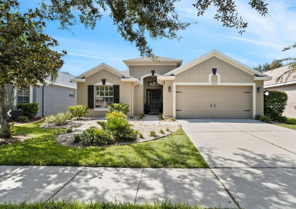 Photo of 18835 Maisons Drive, Lutz, FL 33558 (MLS # TB8455535)