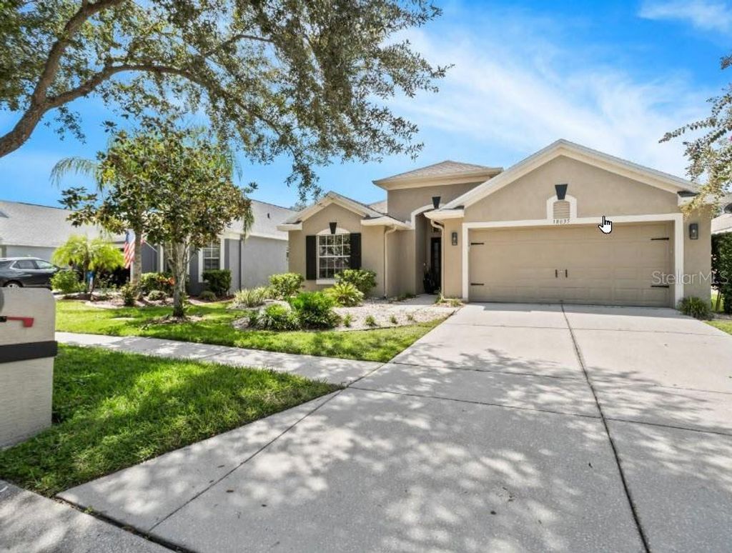 Photo of 18835 Maisons Drive, Lutz, FL 33558 (MLS # TB8455535)