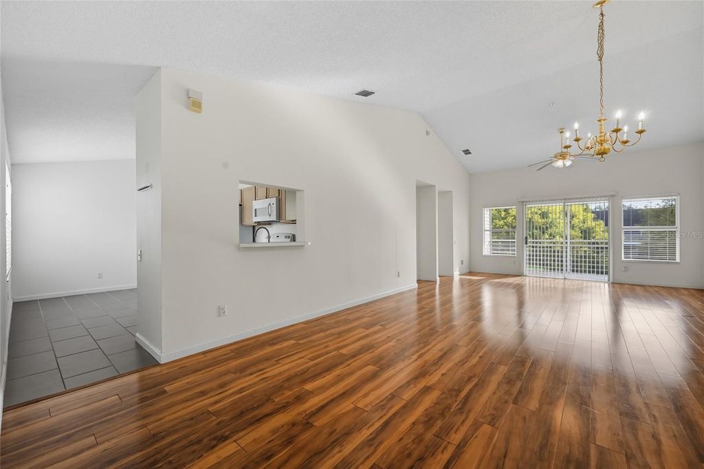 Photo of 6029 Lake Pointe Drive #202, Orlando, FL 32822 (MLS # O6395204)