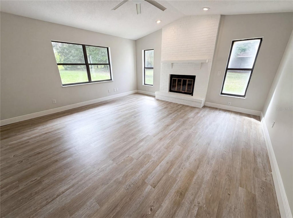 Photo of 9819 E Lake Tahoe Drive, Inverness, FL 34450 (MLS # O6415707)