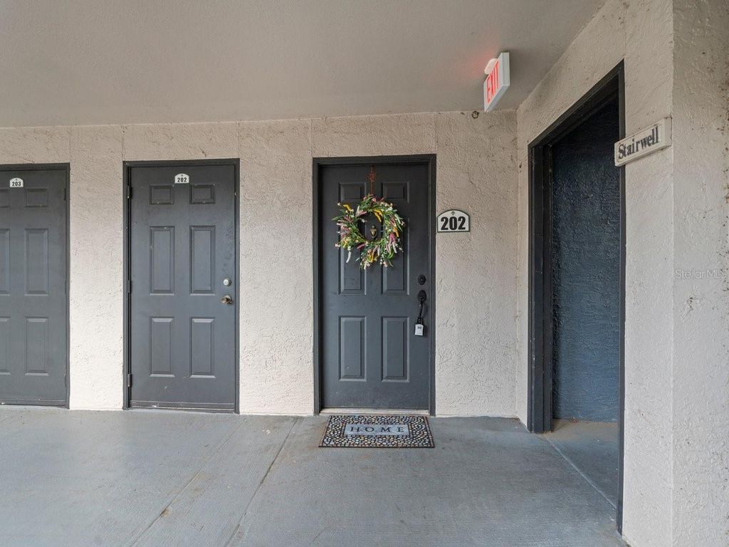 Photo of 12912 Arbor Isle Drive #202, Temple Terrace, FL 33637 (MLS # TB8399662)