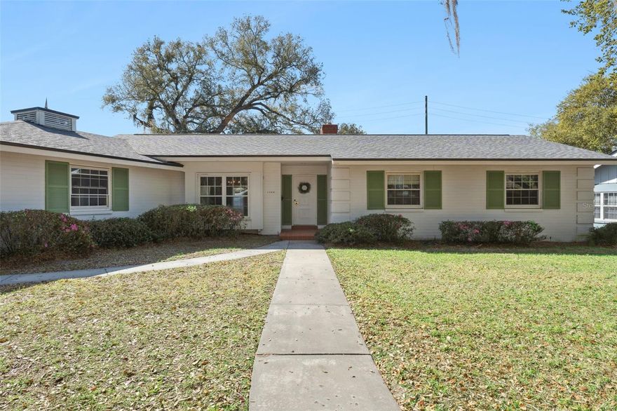 Craving a downtown-adjacent neighborhood? This 3-bedroom, 2½-bath mid-century modern home is located just minutes away in a beautiful area with no HOA. Built with sturdy block construction and full of personality and potential, it sits on a nearly ¼-acre lot in Bel Air Hills, between Lake Lancaster and Hourglass Lake—an area affectionately known locally as Pill Hill. The home’s main living area is spacious and comfortable, flowing easily between the formal dining room, living room, and family room. The kitchen offers abundant counter space and cabinetry, along with a large breakfast nook positioned beside the family room. Windows throughout these three spaces flood the area with natural light and look out onto the large screened porch and backyard. The primary bedroom features two walk-in closets and an en-suite bathroom with a shower. Another bedroom also includes a walk-in closet, while the third bedroom sits conveniently near the hall bathroom with a shower/tub combination. You’ll also appreciate the half bath located in the oversized garage—perfect for washing up after yard work or tackling messy projects. Bel Air Hills offers quick access to the Dr. Phillips Center for the Performing Arts, Thornton Park dining and shopping, Lake Eola, SODO, ORMC / Winnie Palmer hospitals, and Orlando International Airport, only 20 minutes away. Come see this home where historic character meets modern convenience. Call today to schedule your private showing.