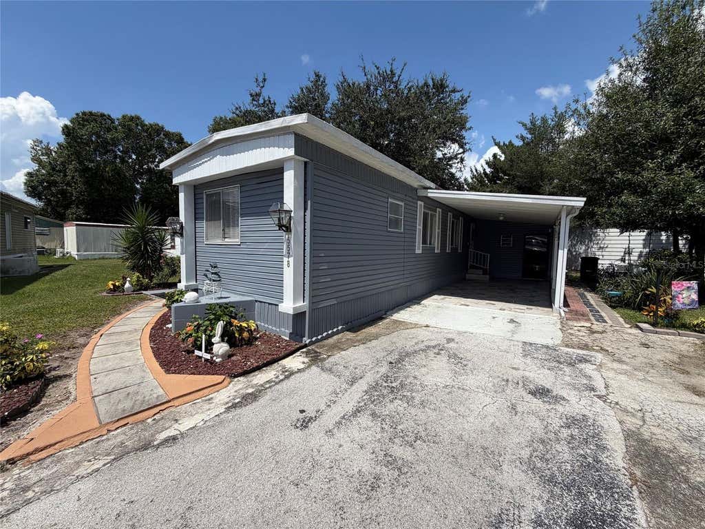Photo of 5578 Denise Ave, Orlando, FL 32810 (MLS # O6436568)