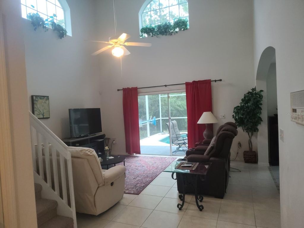 Photo of 449 Hollingshead Loop, Davenport, FL 33896 (MLS # S5140612)