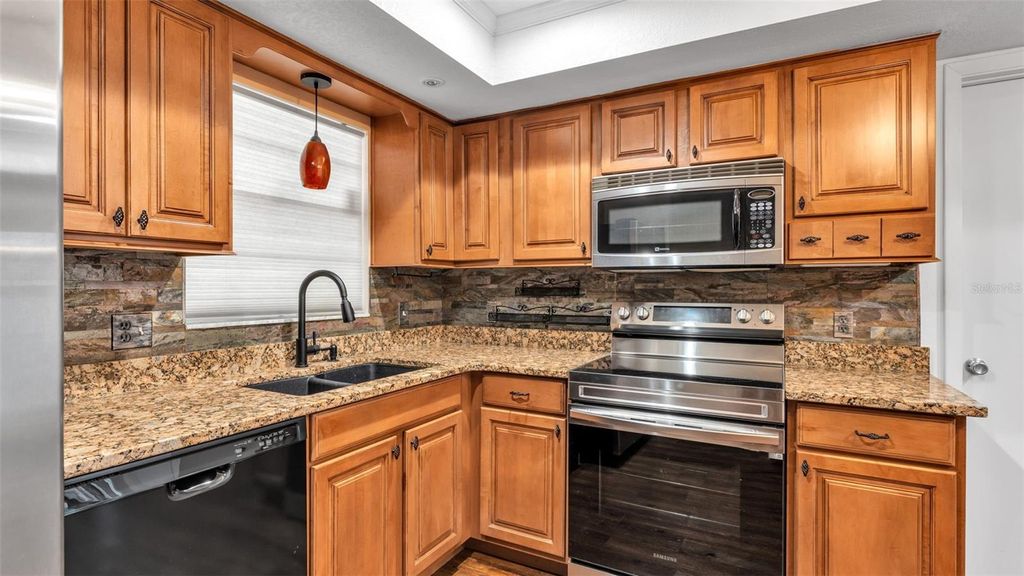 Photo of 553 Villa Vista Boulevard, Lakeland, FL 33813 (MLS # L4957364)