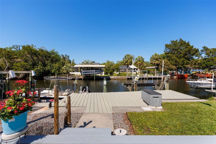Bring your boat and start enjoying all this move-in-ready, furnished, waterfront paradise in the desirable Riverhaven Village Neighborhood has to offer. Located on a deep water canal leading to the Homosassa River and Gulf makes a trip to the nearby spring, restaurants, or fishing grounds a breeze. Must see highlights include two spacious master suites, a completely updated interior, luxury vinyl plank flooring, a boat lift, a new roof (2025), and many upgrades inside and out. The beautiful kitchen includes custom birch cabinets, granite countertops, and new stainless appliances. Work from home in the office or entertain in the spacious living area featuring an open floor plan. Closets throughout the home feature custom built-ins with ample storage. Energy efficient windows and custom window treatments are included as well as furnishings and decor. The inside upgrades and inclusions are just the beginning. 

Step outside to a huge lanai featuring epoxy flooring (2025), as well as screens and vinyl making it the perfect place to soak in the water views all year. From the lanai there is a large deck (2021), dock (2020), and 5000-pound Neptune boat lift (2020) with two new motors (2024). The roof has a transferable 15 year warranty. Electrical box has generator hook up. Hot Water Heater (2018). HVAC (2020). Fresh Exterior paint (2022). New light fixtures, ceiling fans, interior paint, doors and trim (2024). 

Join the optional Riverhaven Village Community Club located across from this home for access to the tennis courts, pickle ball courts, pool, dog park, clubhouse, and regular events. Bring your boat and start enjoying the waterfront lifestyle in time for scallop season. Schedule a showing today.