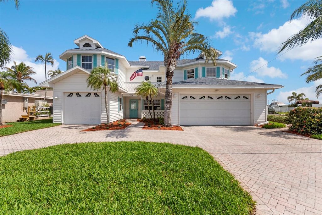 Photo of 11445 9th Street E, Treasure Island, FL 33706 (MLS # TB8489445)