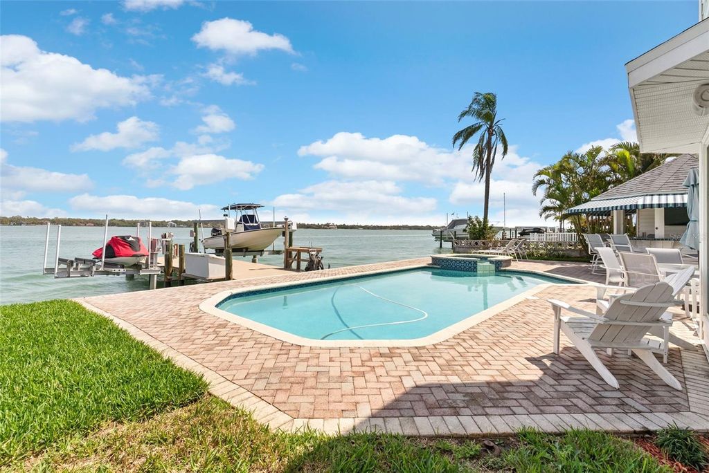 Photo of 11445 9th Street E, Treasure Island, FL 33706 (MLS # TB8489445)