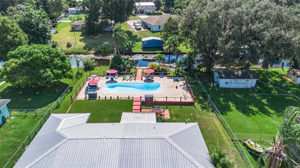 Photo of 114 Lake Huntley Drive, Lake Placid, FL 33852 (MLS # OM710147)