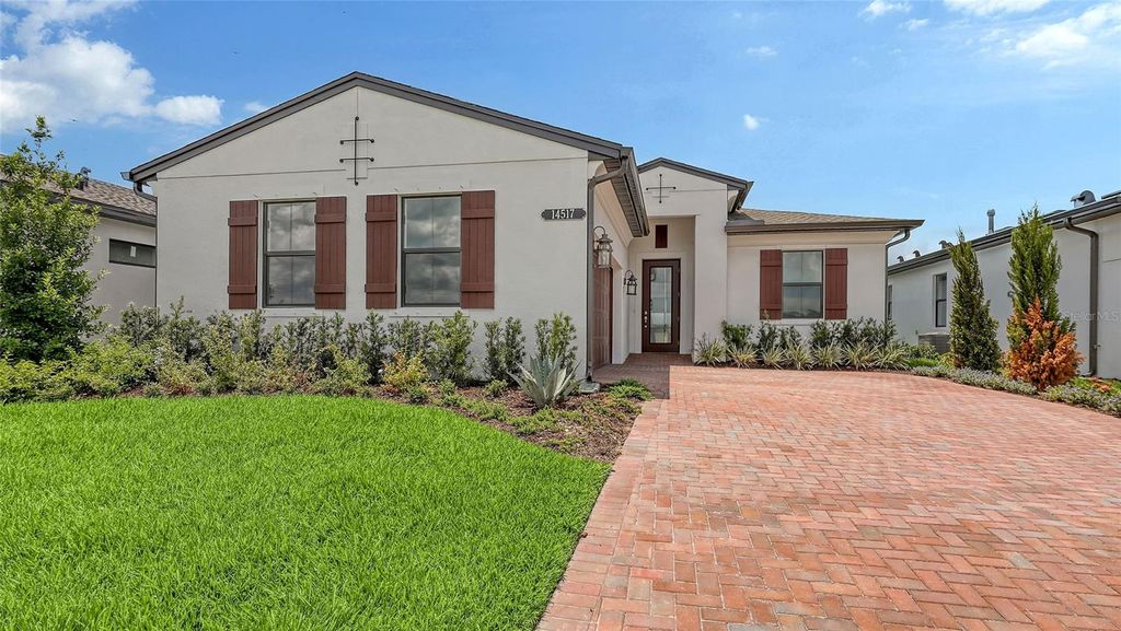 Photo of 14517 Coastal Woodland Lane, Parrish, FL 34219 (MLS # W7881518)