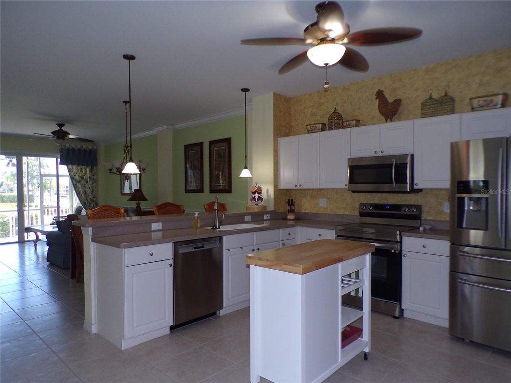 Photo of 1431 Aqui Esta Drive #411, Punta Gorda, FL 33950 (MLS # C7524688)